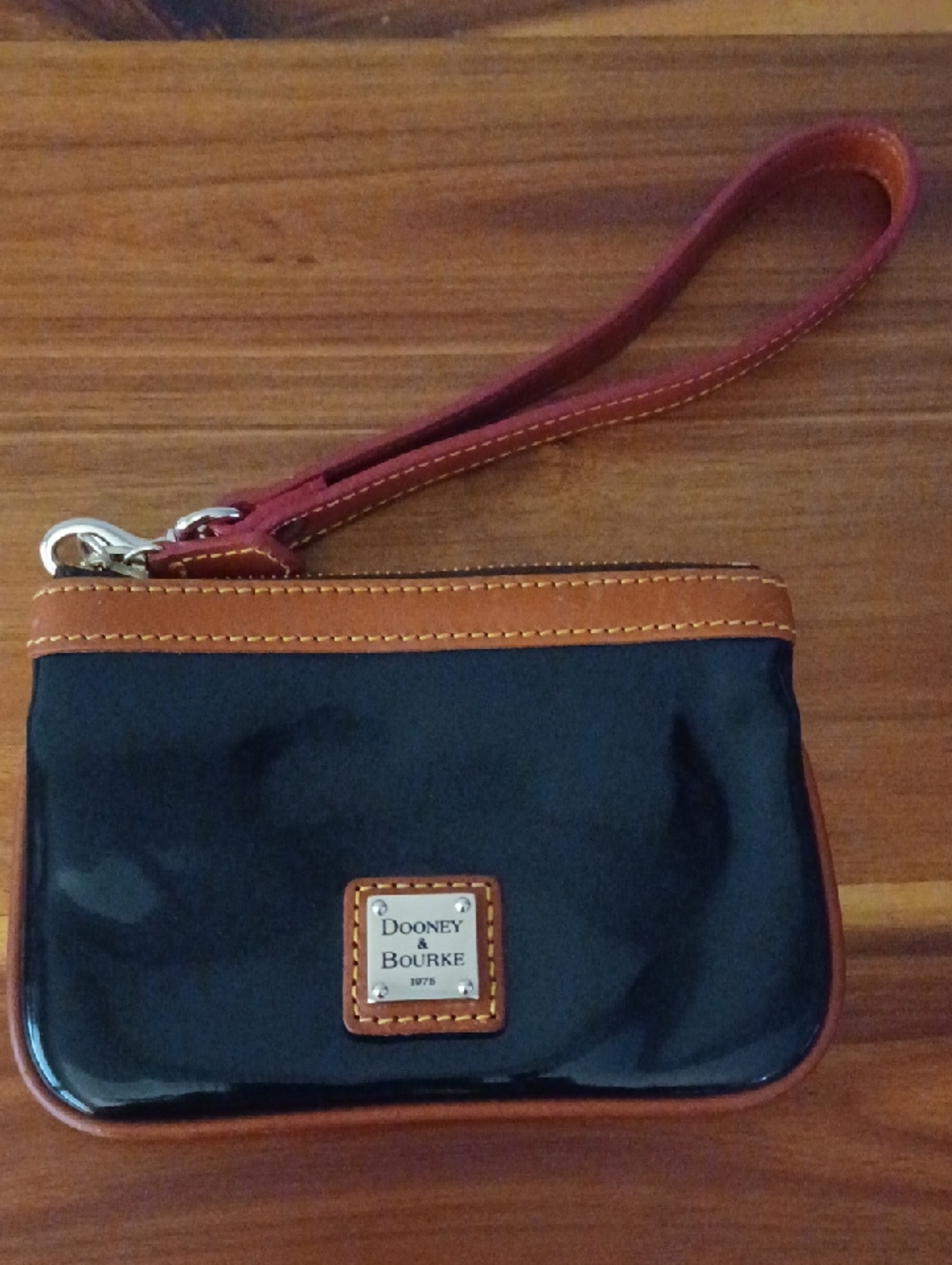 Dooney & Bourke Black Patent Wristlet with Brown Trim